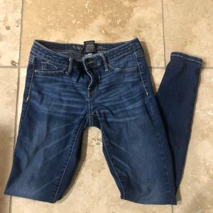 Mid rise stretchy skinny jeans size 2